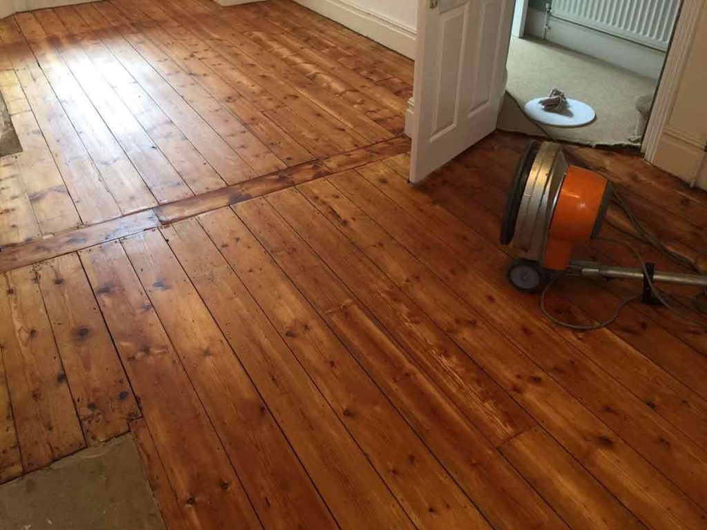 After wood floor sanding and oil finishing in Exeter home