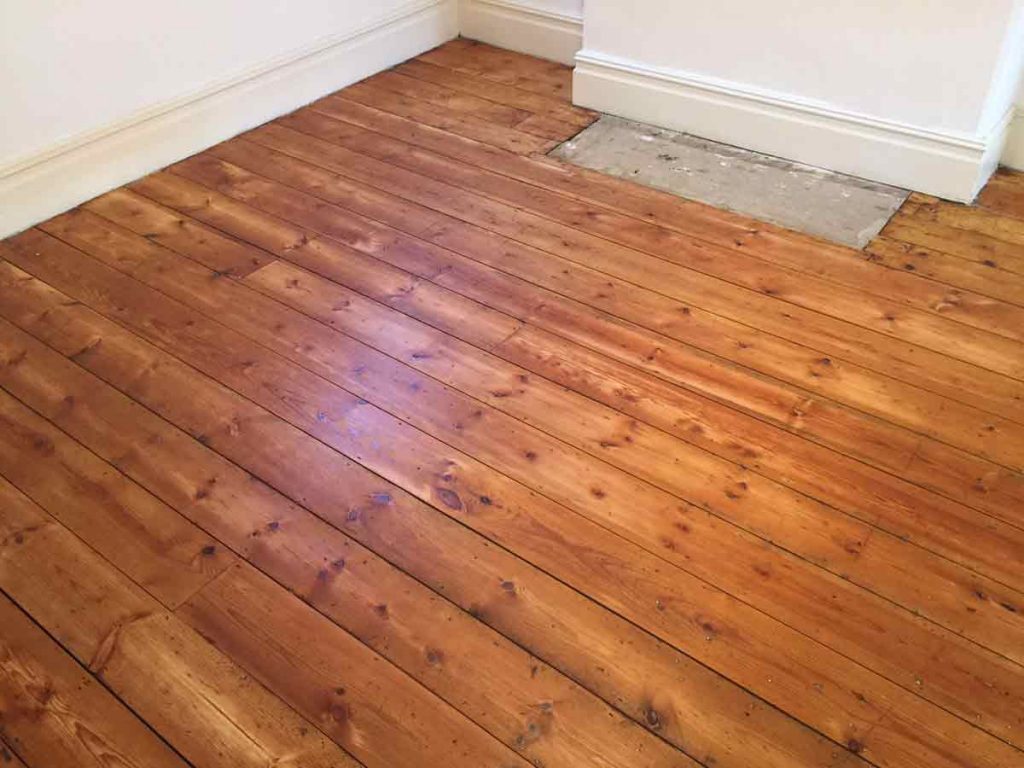 After wood floor sanding and oil finishing in Exeter home
