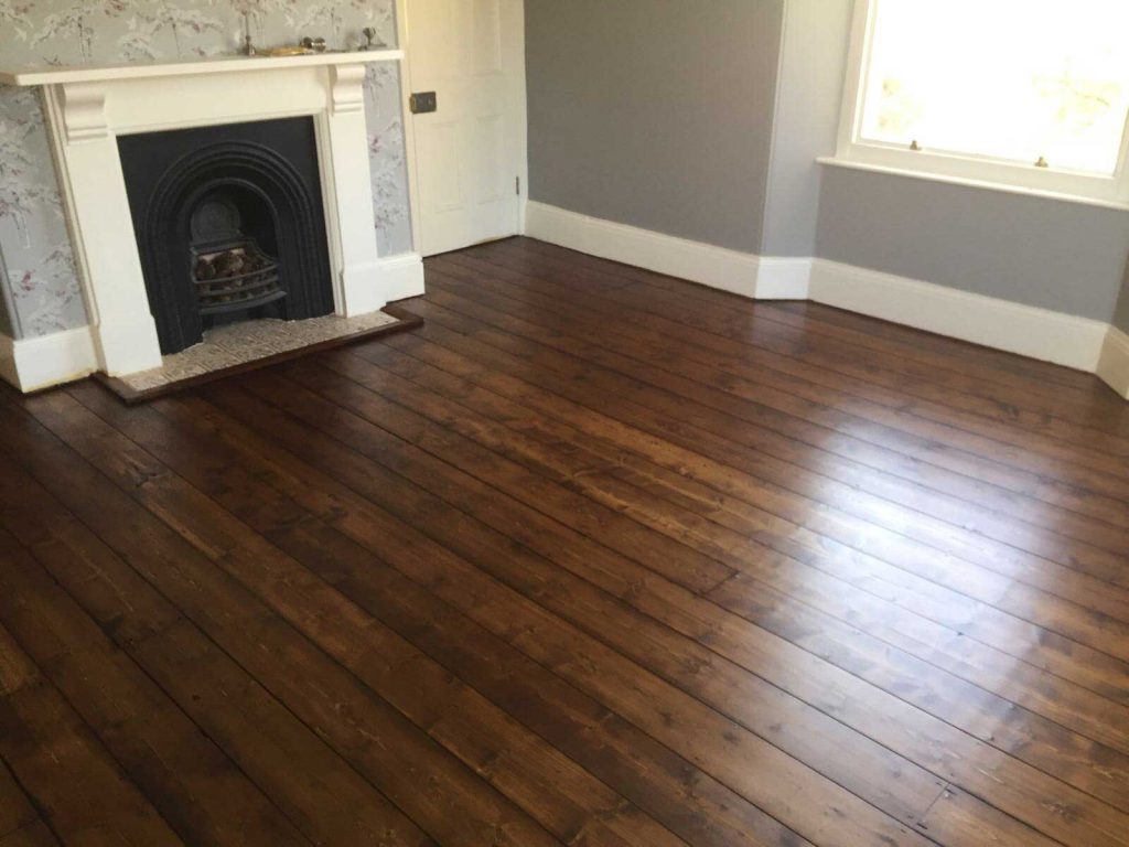 Lustleigh home has wooden floors restored in 20 rooms which involved carpentry repairs, sanding, staining and finishing with lacquer