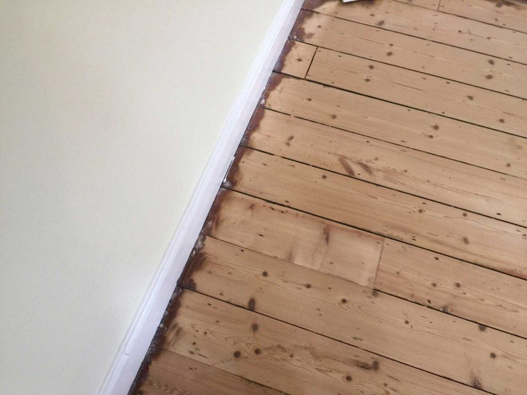 Sanding a wood floor after repairs