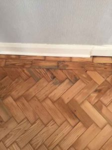 Results of carpentry repairs to wooden floor