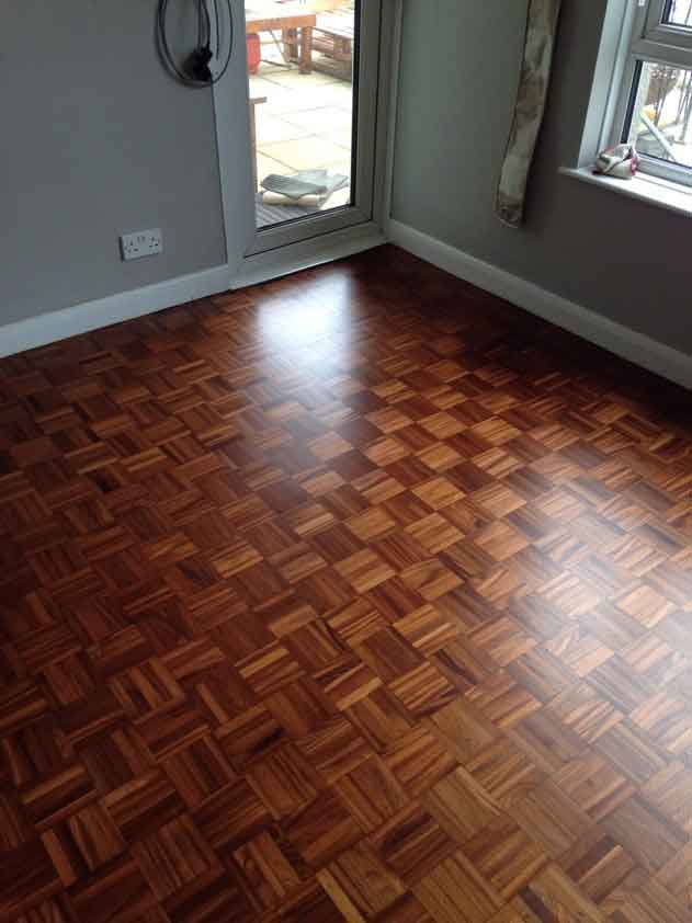 Flawless Finish after repairs to Teak Five Finger Parquet Wooden Floor in Brixham Devon