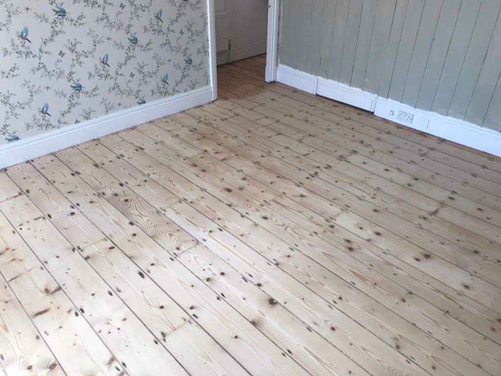 Restoring pine wooden floors in Torquay, Devon