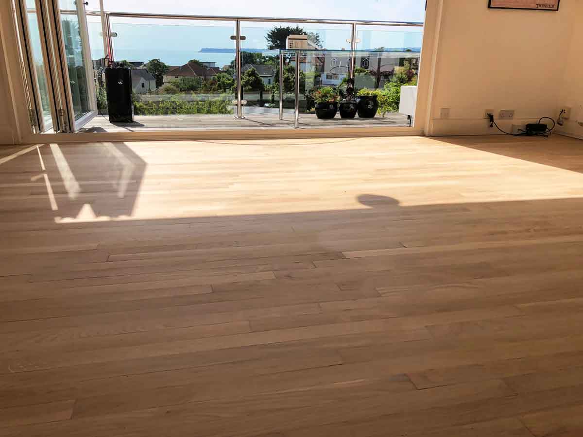 Sanding preparation of oak wooden floor in Torquay